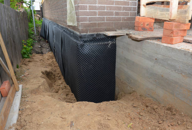 SJ Waterproofing Pros technician performing targeted Sump Pump Installation assessment in Rossville, TN
